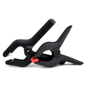 VisiJet M2R-BK rigid black photopolymer shown as a high-resolution prototyping material with smooth surface finish 3D resin detail on functional parts.